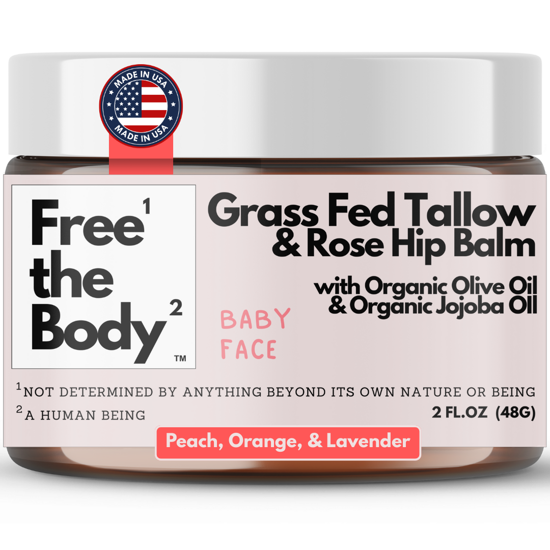 Balm jar labeled 'Free the Body' with grass fed tallow and rose hip ingredients on a white background.